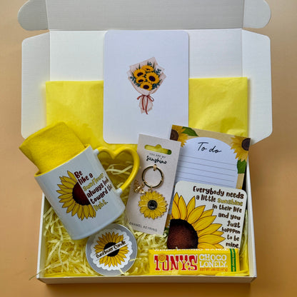 Sunflower gift box with sunflower mug, cozy yellow socks, candle, keyring, coaster, notepad, greeting card and Tony's Chocolonely chocolate