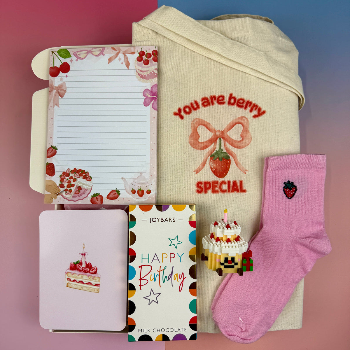 Strawberry birthday gift box with You Are Berry Special tote bag, pink strawberry socks, strawberry notepad, birthday chocolate, greeting card and mini cake figure